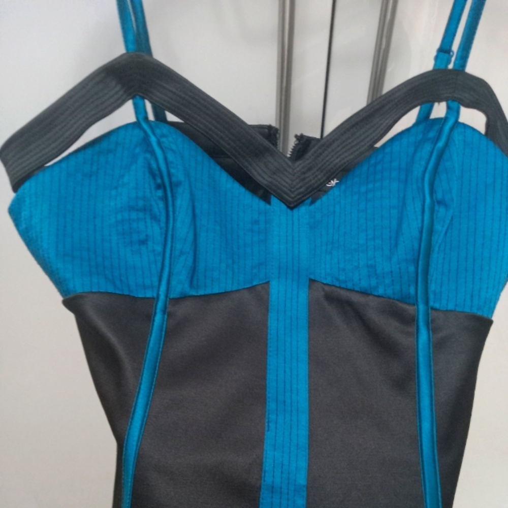 Bebe cut-out corset top.